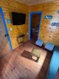 TV a/nebo společenská místnost v ubytování Cabaña punta de Lobos + 3 fotografie