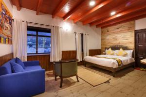 Postel nebo postele na pokoji v ubytování Hotel Oms Home