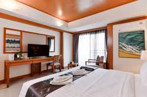 Et tv og/eller underholdning på Green Residence Ayutthaya - SHA Certified