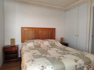 En eller flere senge i et værelse på Departamento Duplex 3 dormitorios , 3 baños + 19 billeder