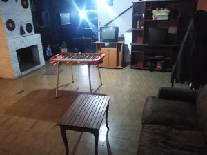 Et opholdsområde på Chalet con Cochera techada