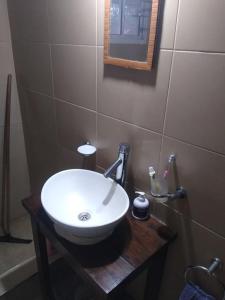 Et badeværelse på Chalet con Cochera techada + 1 billede