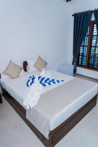 Postel nebo postele na pokoji v ubytování US Cabanas + 53 fotografií