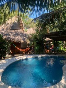 Bazén v ubytování Sunrise El Paredón nebo v jeho okolí