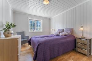 En eller flere senge i et værelse på Luxury cabin with amazing views