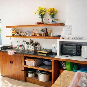 Kuchyň nebo kuchyňský kout v ubytování NOMAD Home & Coffee