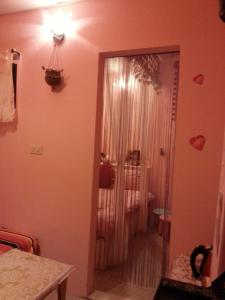 Postel nebo postele na pokoji v ubytování Wangyuku B&B