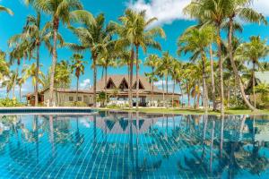 Bazén v ubytování Paradise Sun Hotel Seychelles nebo v jeho okolí