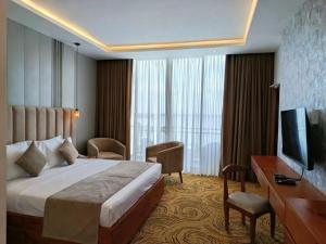 TV a/nebo společenská místnost v ubytování Ramadia Grand Holiday Resort