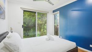 Giường trong phòng chung tại Station on Pearce