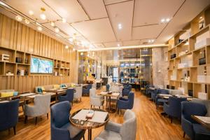 Χώρος καθιστικού στο Echarm Hotel Changchun Yiqi Automotive Trade City Wanda