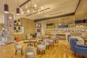 Un lugar para sentarse en Echarm Hotel Liuzhou High-speed Railway Station