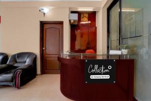 Posezení v ubytování Super Collection O KSRTC Bus Station Kottayam Formerly Hotel O Day Springs