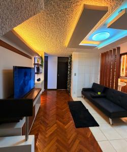 Et tv og/eller underholdning på Dúplex céntrico y amplio, terraza cochera free