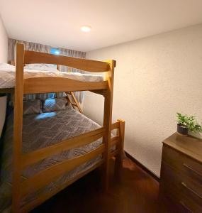 En eller flere senge i et værelse på Dúplex céntrico y amplio, terraza cochera free