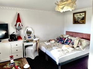 Ένα ή περισσότερα κρεβάτια σε δωμάτιο στο K&B Residence