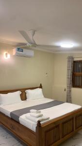 Postel nebo postele na pokoji v ubytování Roots