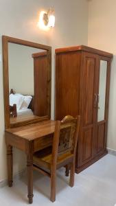 Postel nebo postele na pokoji v ubytování Roots + 2 fotografie