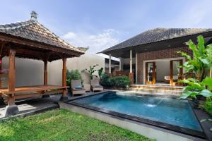 Swimmingpoolen hos eller tæt på Semana Cliff Villa Ubud + 10 billeder
