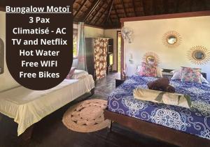 Postel nebo postele na pokoji v ubytování Pension Hibiscus Taha'a