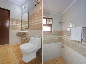 Koupelna v ubytování Hotel O Elite Stay + 14 fotografií