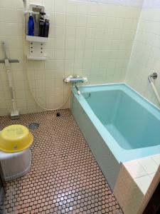 Et badeværelse på Ogoto House Rake Omi