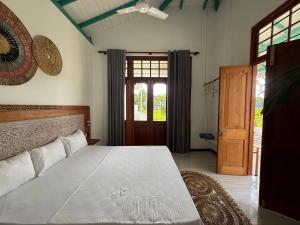 Postel nebo postele na pokoji v ubytování ISOLA - Surf House