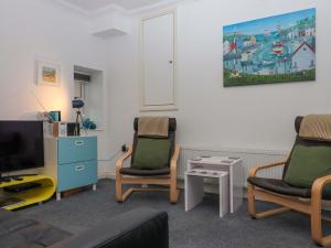 TV a/nebo společenská místnost v ubytování Cottage 1 Newcourt