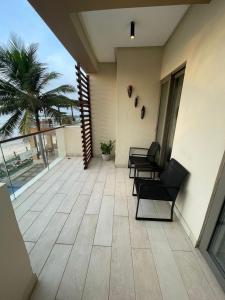 En balkon eller terrasse på Kokrobite beach Residences and Spa