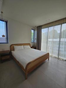 Giường trong phòng chung tại Villa Ankh Phangan +14 ảnh