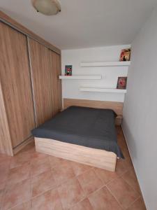 Postel nebo postele na pokoji v ubytování Frangepan