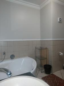 Et badeværelse på Premium Getaway @ la Bella Costa