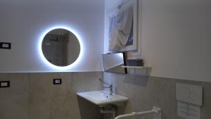 a bathroom with a sink and a mirror at Agriturismo Ai Progni in Affi