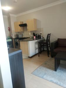 Køkken eller tekøkken på Premium Getaway @ la Bella Costa