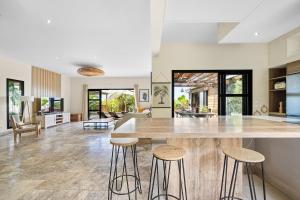 Posezení v ubytování La Villa des Sables Noirs - L'Étang Salé