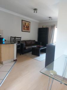 Et opholdsområde på Premium Getaway @ la Bella Costa