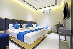 TV/trung tâm giải trí tại Hotel Ginger Palace Delhi Airport