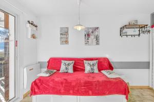 Ένα ή περισσότερα κρεβάτια σε δωμάτιο στο Superdévoluy Les Issarts