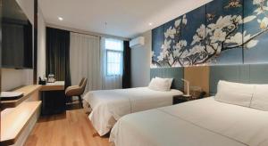 Ένα ή περισσότερα κρεβάτια σε δωμάτιο στο Magnotel Shanghai Henglong Plaza +224 φωτογραφίες