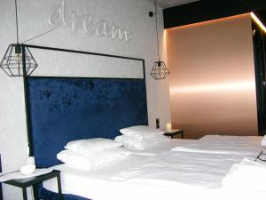 En eller flere senge i et værelse på Czarna Góra- Biała Perła z mini aneksem - 403