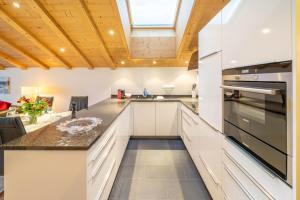 Køkken eller tekøkken på Penthouse Matterhorn Vista