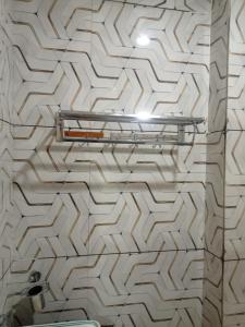 Ένα μπάνιο στο Hotel Shri Vallabh kripa