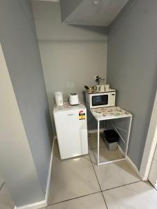 Kuchyň nebo kuchyňský kout v ubytování Aussie Rest Motel