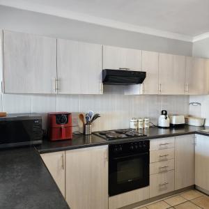 Køkken eller tekøkken på No 4 Bayview Manor + 7 billeder