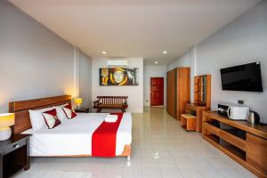 Postel nebo postele na pokoji v ubytování Chernin Apartment Suites + 18 fotografií