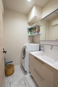 Koupelna v ubytování ローズパーク十番館