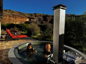 Swimmingpoolen hos eller tæt på Aasvogelkrans Farm Cottages & Camping