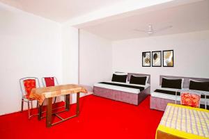 Posezení v ubytování Hotel O by OYO Kalka