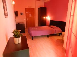 Postel nebo postele na pokoji v ubytování Hotel I Colori