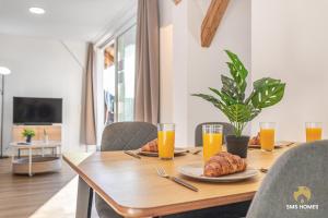 Et tv og/eller underholdning på SMS-Homes I Auszeit am See #2